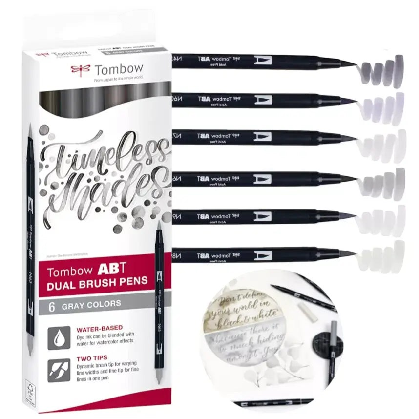 Eira Haul Tombow ABT dual brush pens in a 6-piece gray color set with flexible brush and fine tips for calligraphy.