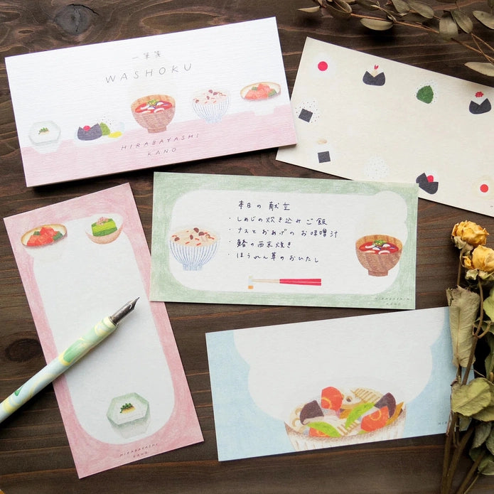 Set of stationery items in washoku set on a wooden surface