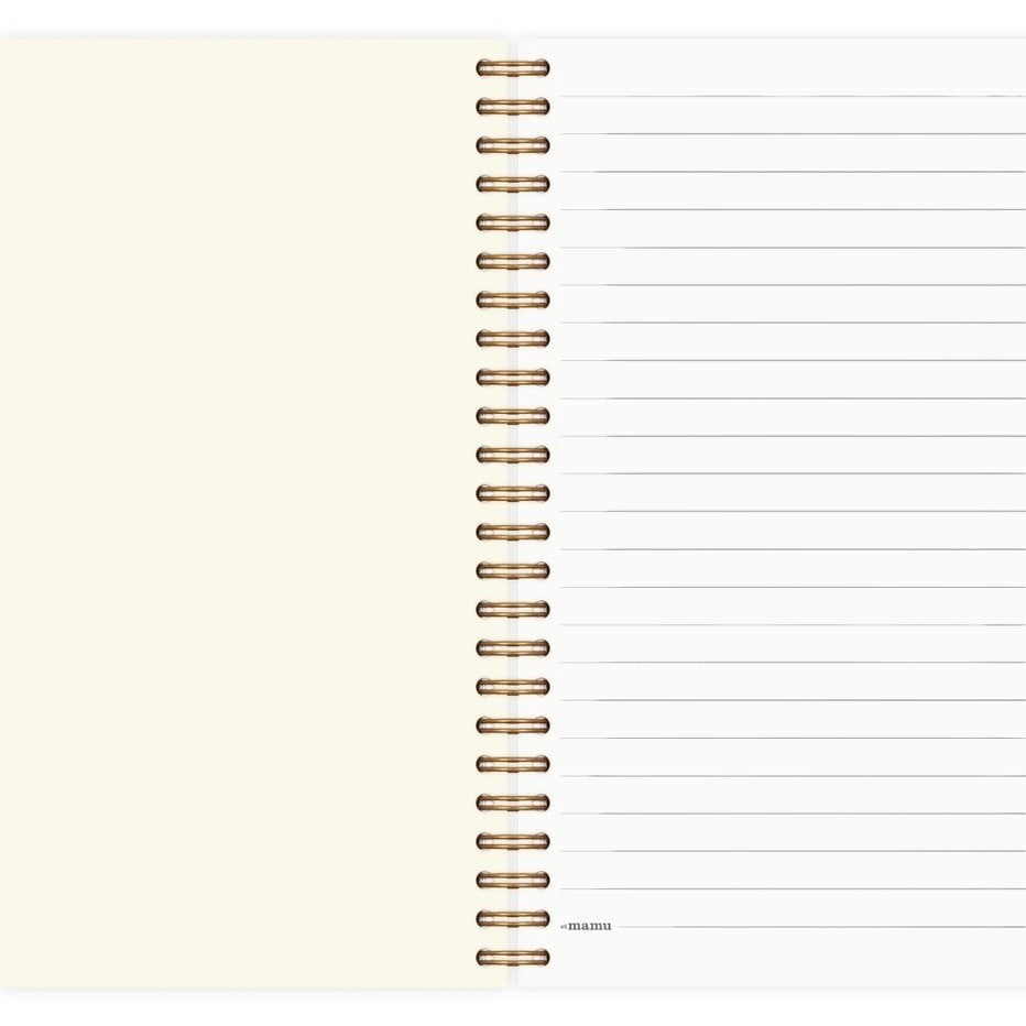 Eira Haul A5 eucalyptus notepad with black wire comb binding and lined pages showing a clean interior layout