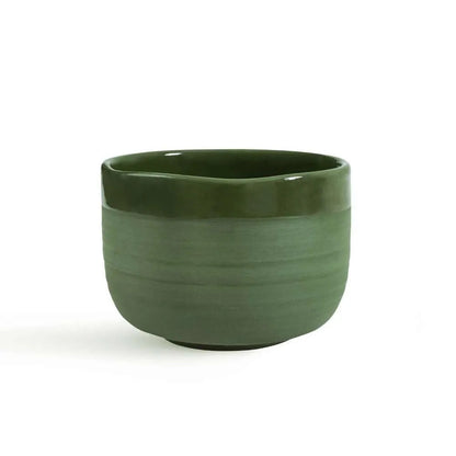 Eira Haul Midorinami handmade porcelain matcha bowl in deep green with a matte exterior and glossy interior finish.