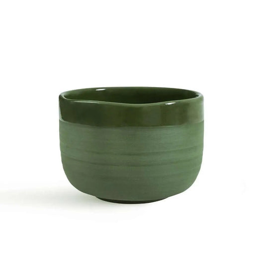 Eira Haul Midorinami handmade porcelain matcha bowl in deep green with a matte exterior and glossy interior finish.