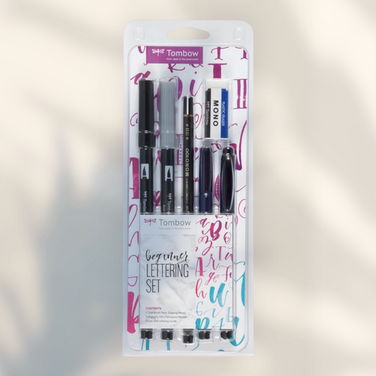 Eira Haul Tombow beginner hand lettering set featuring dual brush pens, calligraphy markers, pencil, and eraser.