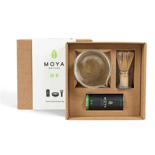 Traditional matcha starter set with a glass bowl and spout for preparing matcha tea.