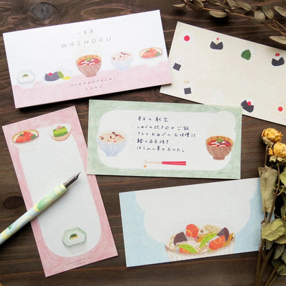 Set of stationery items in washoku set on a wooden surface
