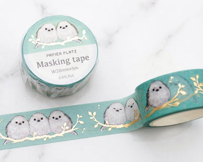 Washi tape featuring cute Shima-enaga birds by Milina, with a charming Japanese-inspired design on a table.